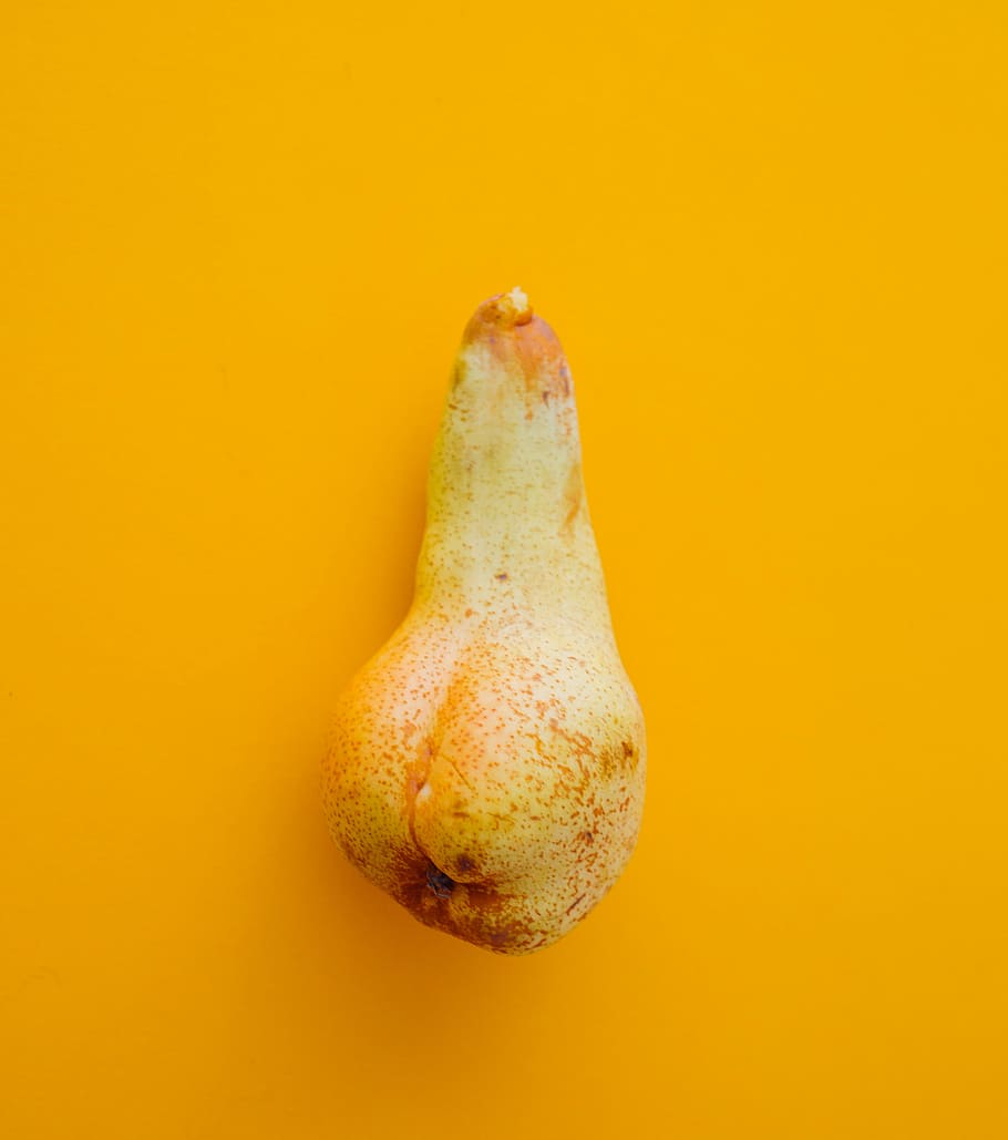 yellow vegetable on orange surface, pear, fruit, stalk, backdrop HD wallpaper
