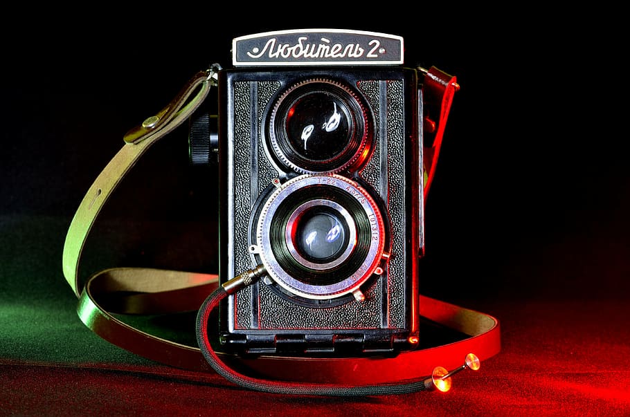 close-up photography of black camera, cameras, old, antique, black and white