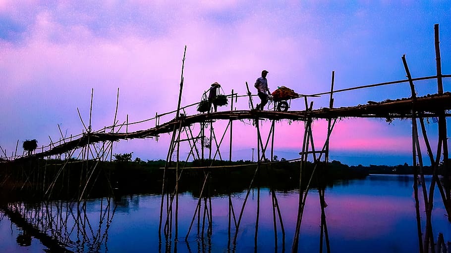 men, people, work, bridge, wood, stilts, support, water, reflection HD wallpaper