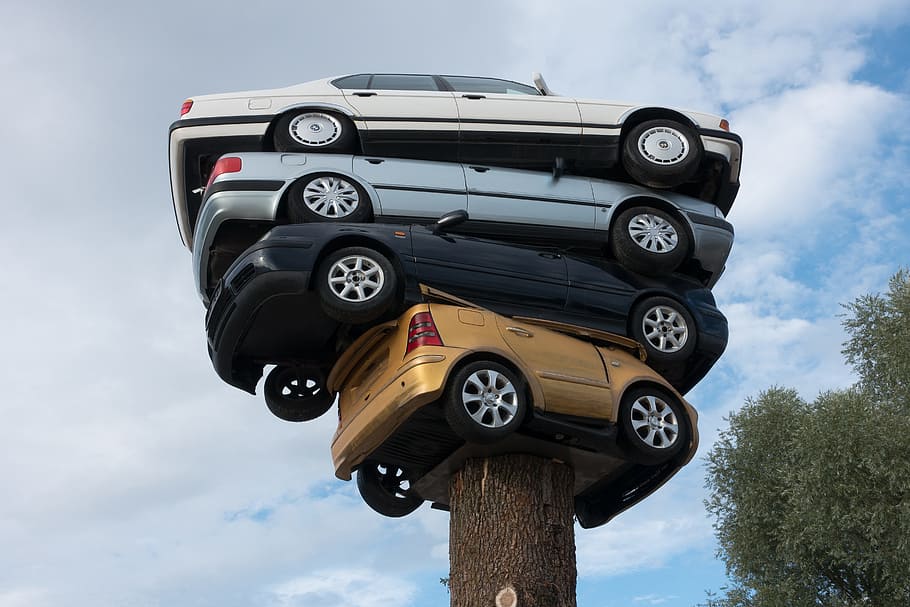 stack of four cars on brown wooden trunk, Auto, Installation, Art HD wallpaper