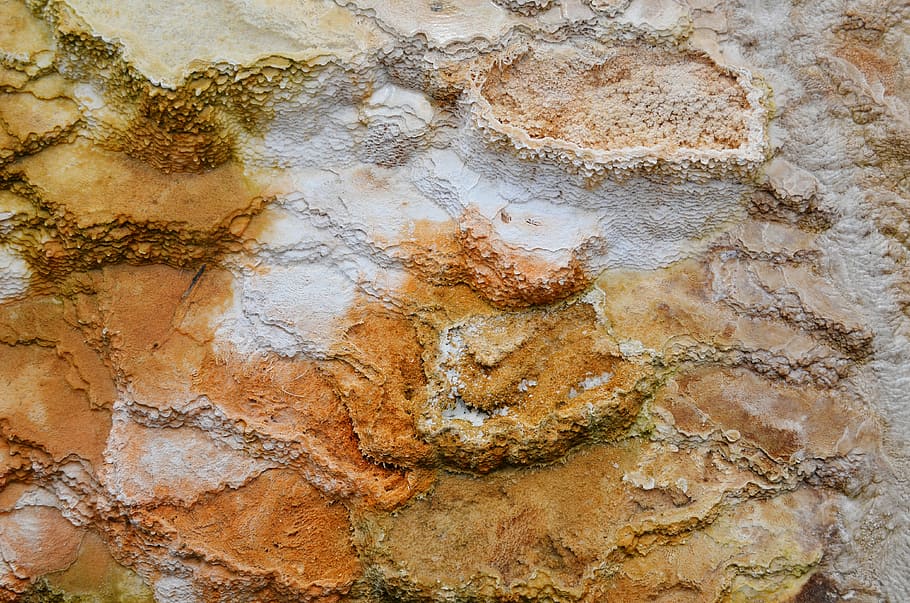 brown and grey surface, aerial photography of rock formations HD wallpaper