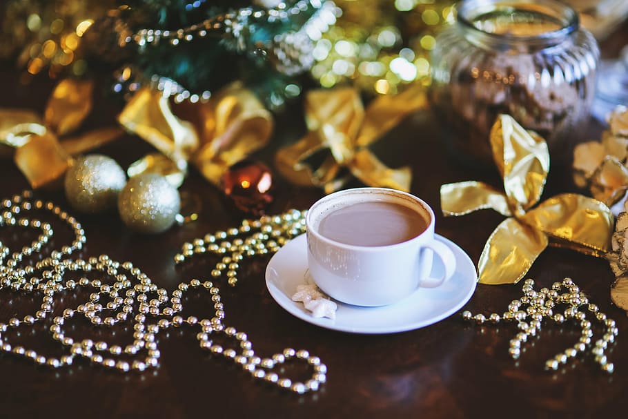 cup of coffee on white ceramic saucer beside silver-colored beads, gold ribbons, and silver baubles Christmas ornaments, HD wallpaper