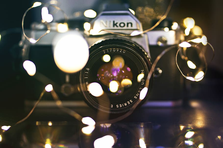 bokeh photography of Nikon DSLR camera, black Nikon DSLR camera, HD wallpaper
