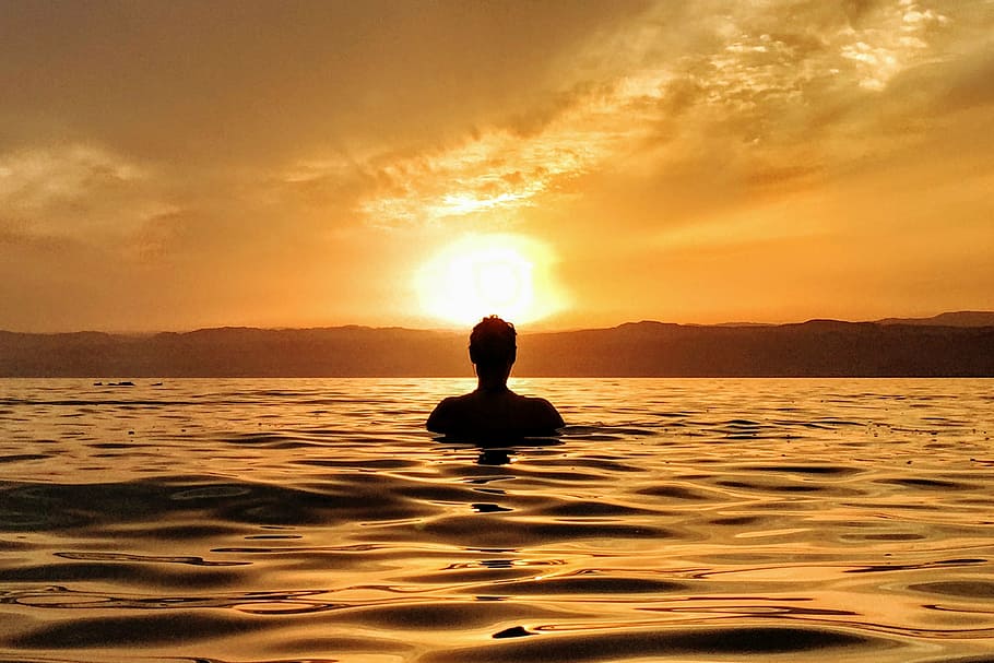 silhouette photography of person swimming, man, surrounded HD wallpaper
