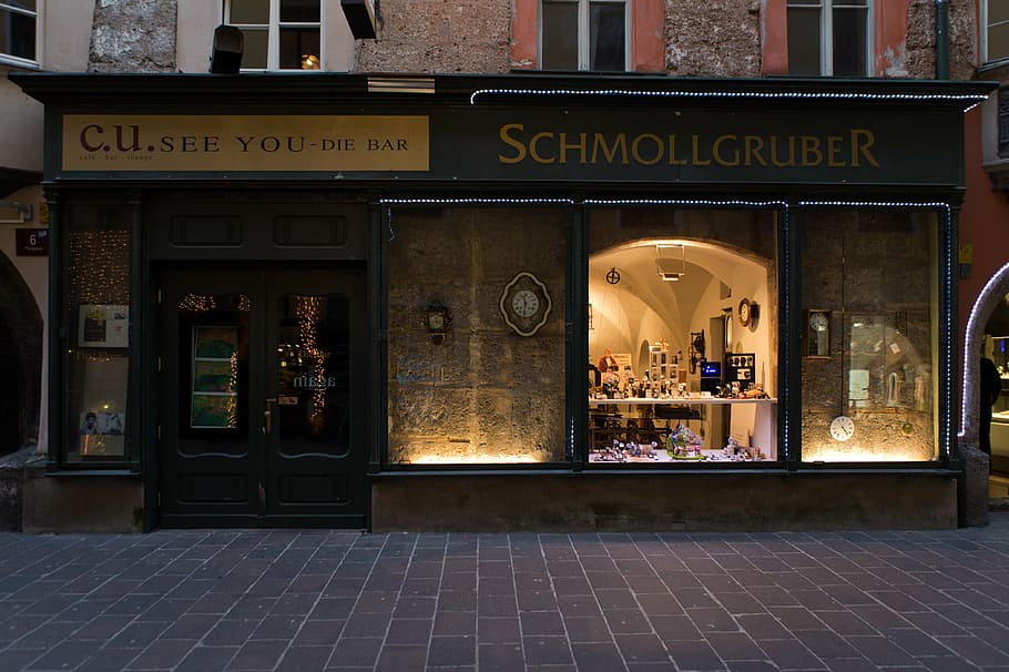 C.U. See You Die bar beside Schollgruger signs, watchmaker HD wallpaper