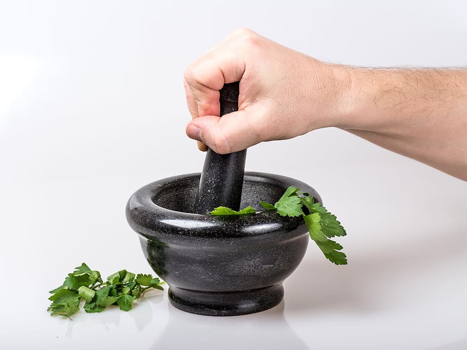black mortar and pestle, crushed, hand, bowl, container, leaves, HD wallpaper