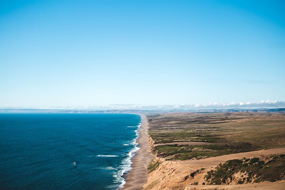 birds eye view photo of seashore, blue ocean waves during daytime HD wallpaper