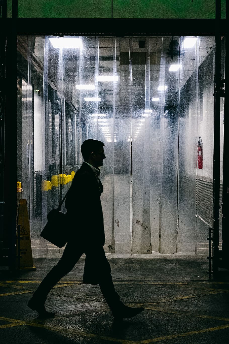 man walking in front of car wash garage, man walking beside air curtain HD wallpaper