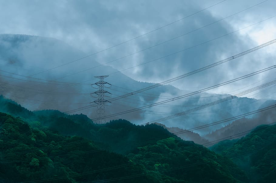 green leaf trees on mountain under cloudy sky during daytime, black electricity post at mountain under cloudy sky HD wallpaper