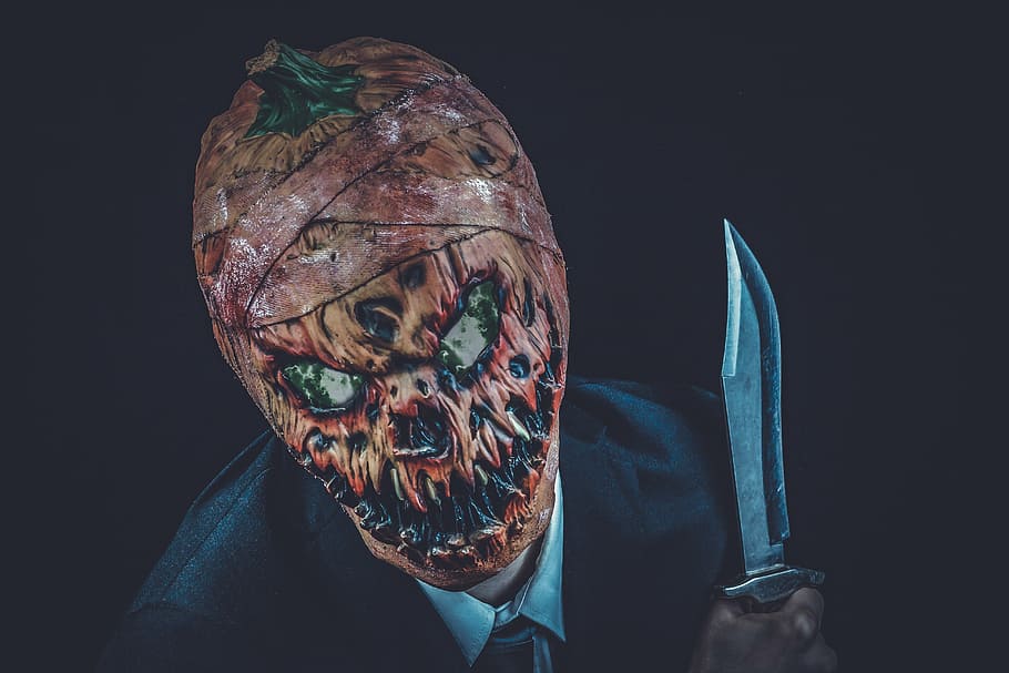 pumpkin head person holding knife, halloween, horror, scary, creepy