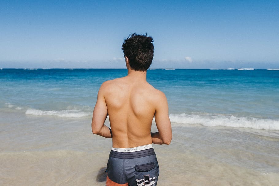 man on shoreline, man facing sea horizon, sandy, surfer, boy HD wallpaper