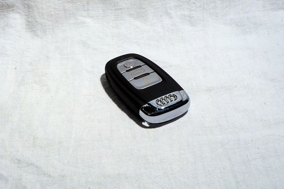 black and gray Audi vehicle fob on white textile, Car Keys, Open Door, HD wallpaper