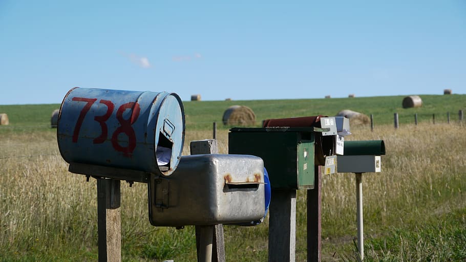 five assorted-color mailboxes on field, letter boxes, australia, HD wallpaper