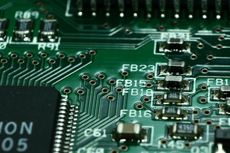 closeup photo of computer part, printed circuit board, print plate