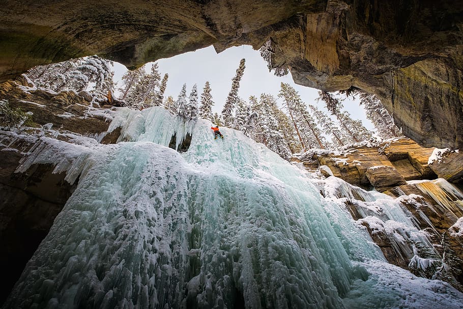 Feeling small., person on waterfalls during daytim, nature, rock - Object HD wallpaper