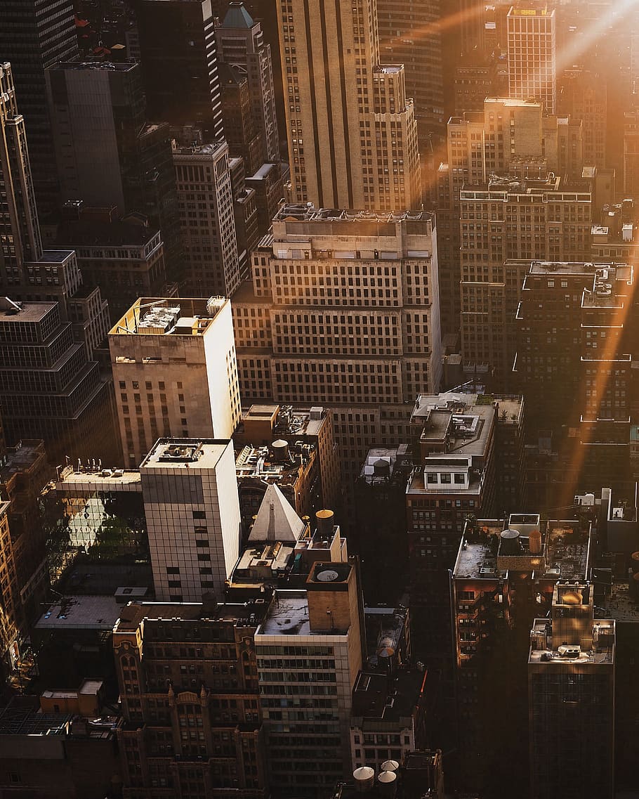 architectural photography of buildings, aerial photography of building during sunset HD wallpaper