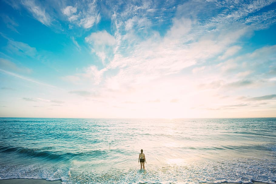 woman standing on seashore, beach, horizon, nature, ocean, outdoors HD wallpaper