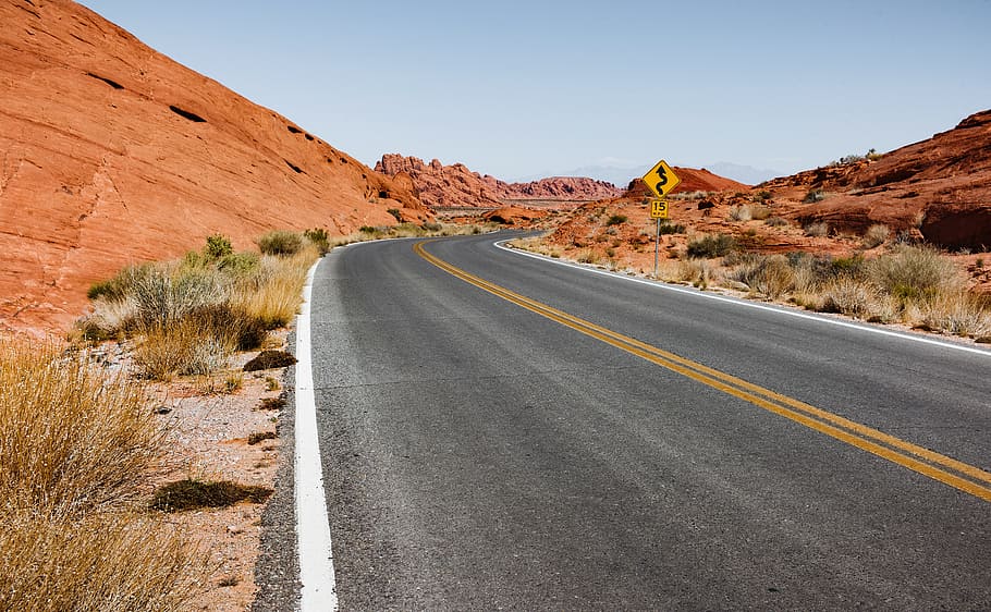 road near hills during daytime, arid, asphalt, barren, desert HD wallpaper