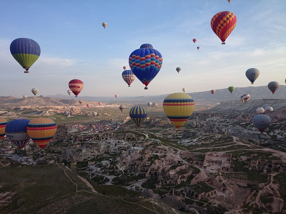 aerial view of hot air balloons during daytime, cappadocia, turkey