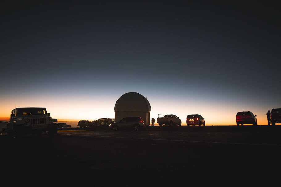 assorted vehicles parked under gray sky during sunset, silhouette of vehicles and house during golden hours HD wallpaper