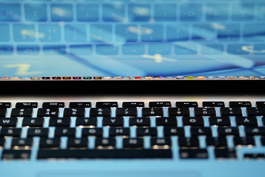 MacBook Pro with blue wallpaper, close, photo, turned, laptop HD wallpaper