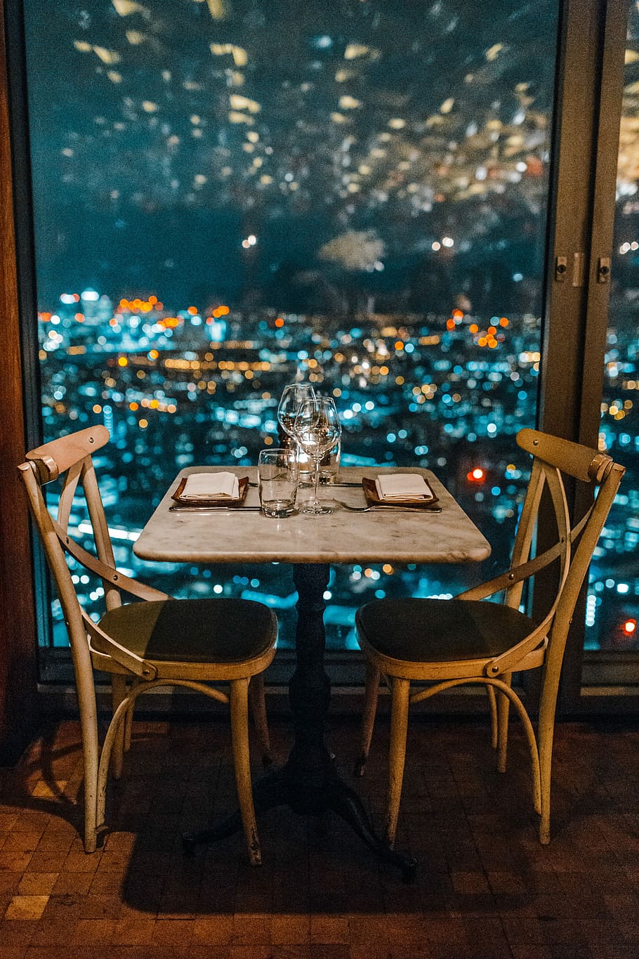 Lovely place to dinner, gray graphit table with two chairs, cityscape HD wallpaper