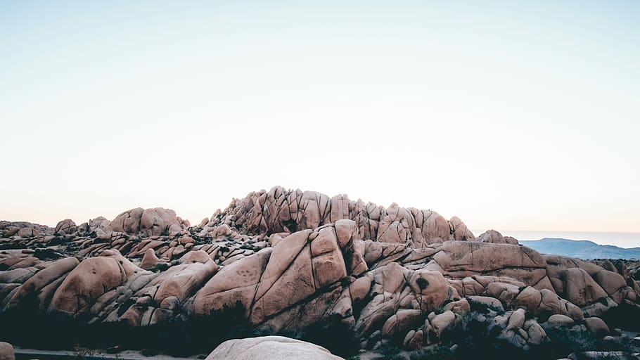 scenery of mountain, brown rock formation under white sky during daytime HD wallpaper