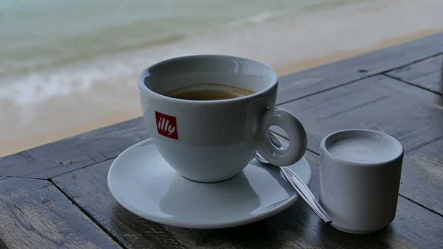coffee filled teacup on saucer, table, sea, break, coffee break HD wallpaper