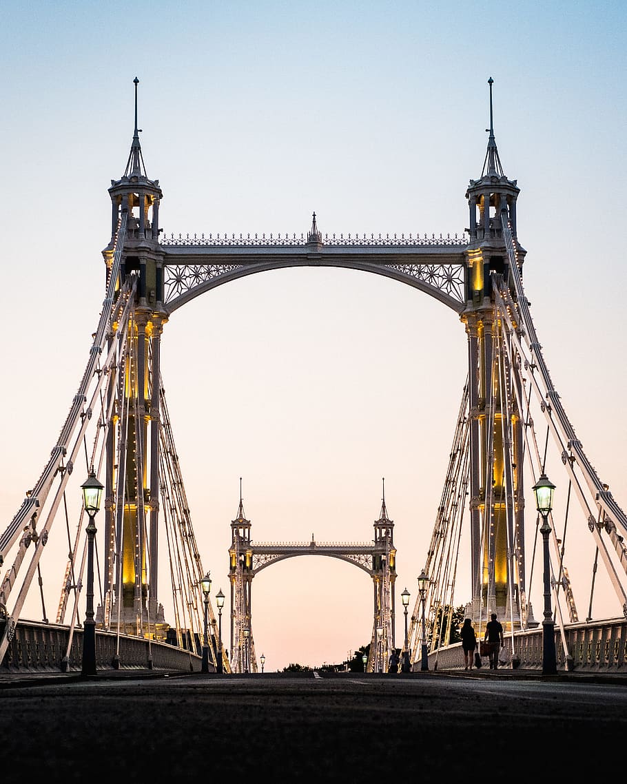 man and woman walking on London bridge, landscape photography of brown and gray concrete bridge HD wallpaper
