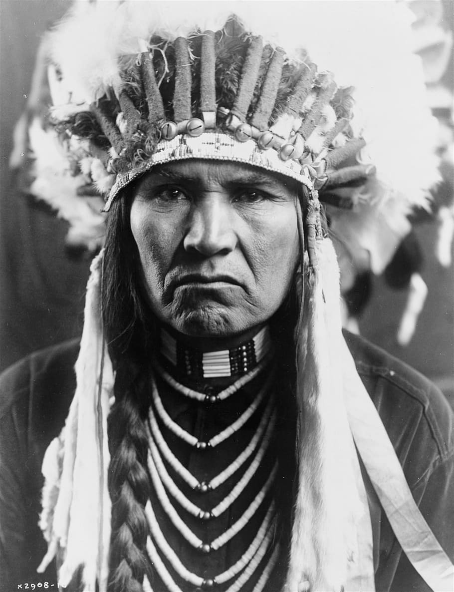 person with brown head dress, historical, vintage, sioux, indian