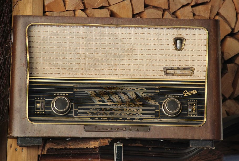 brown transistor radio on brown surface, antique, nostalgia, radio device