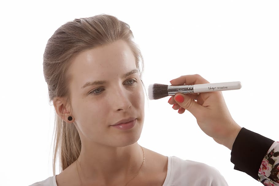 person applying makeup to woman, makeup brushes, brush set HD wallpaper