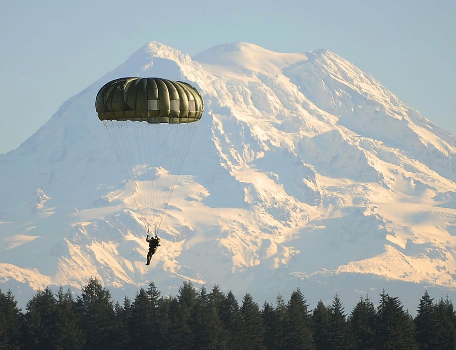 man using green parachute during daytime and mountain alps at distance, HD wallpaper