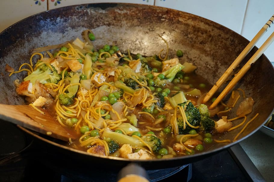 cooked broccoli with pasta and meat on wok, stir-fry, vegetables