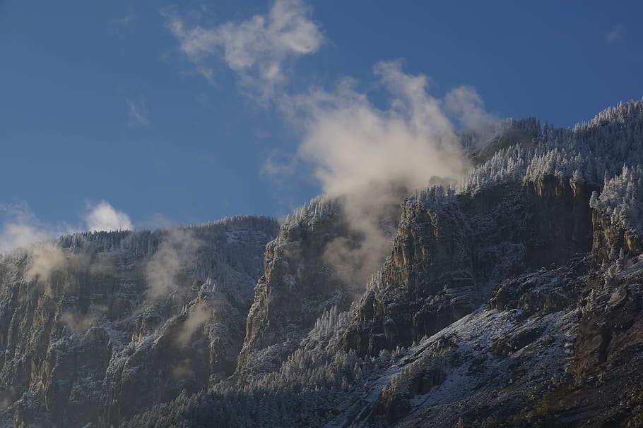 mountains, clouds, fog, haze, rock, alpine, nature, snow, forest HD wallpaper