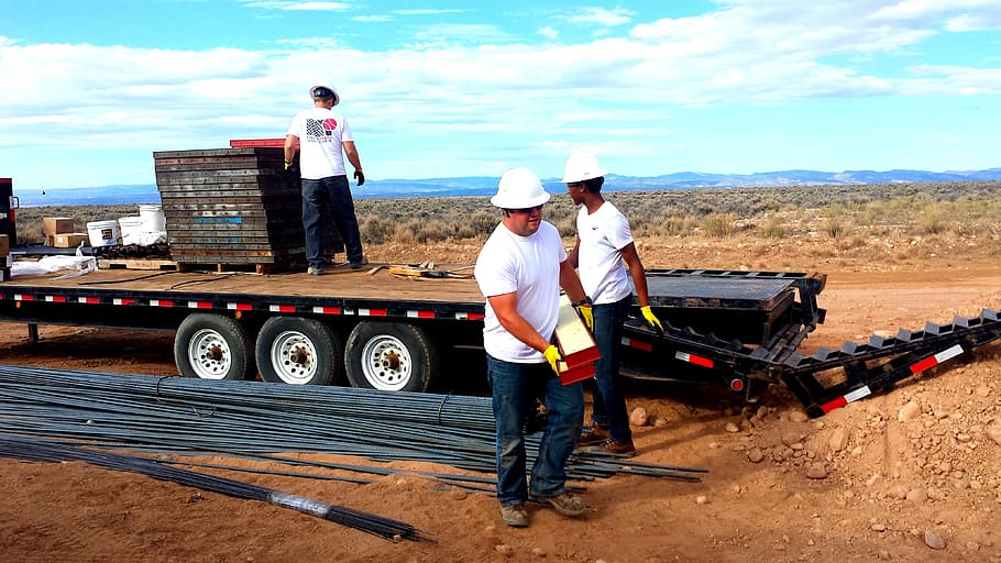 man carrying bar beside flat-bed truck, workers, construction worker HD wallpaper