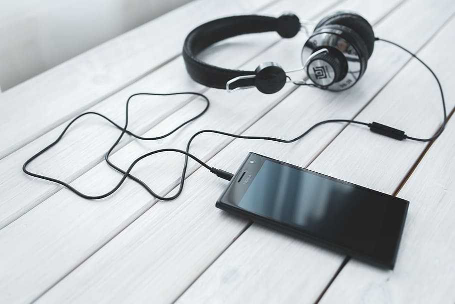 Black smartphone and headphones on a desk, audio, black-and-white, HD wallpaper