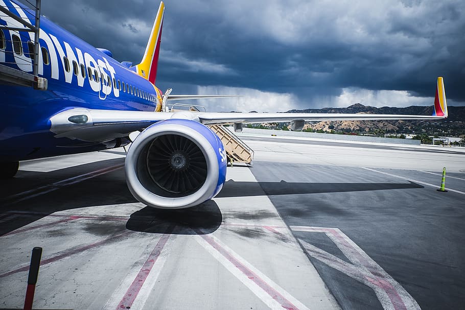 passenger plane on airport under gray cloudy sky, Flight 1669 HD wallpaper
