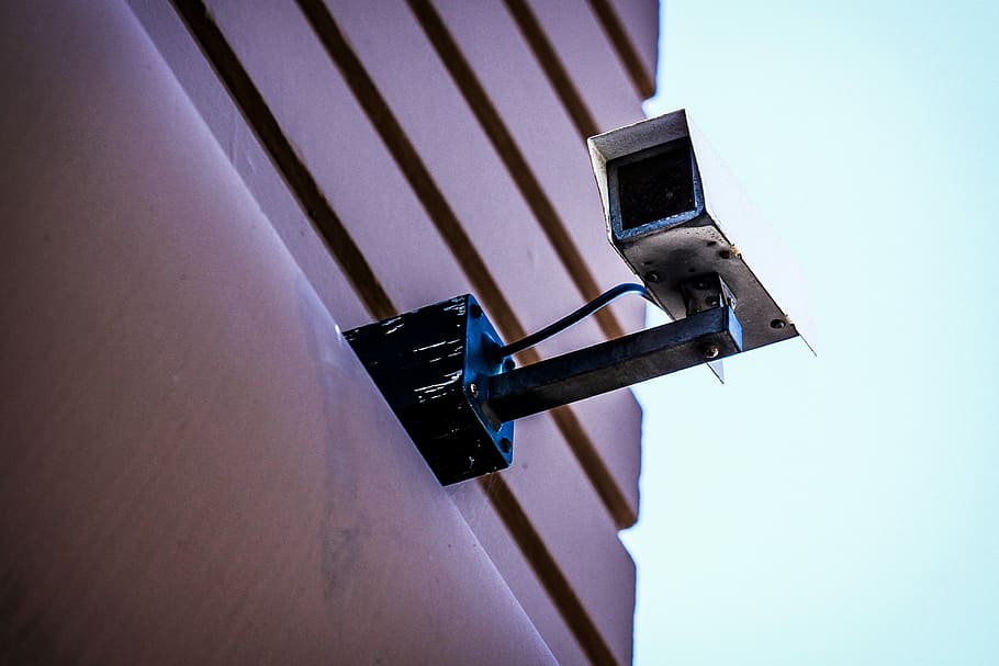worm's eye view photography of white CCTV camera mounted on brown building during daytime, HD wallpaper