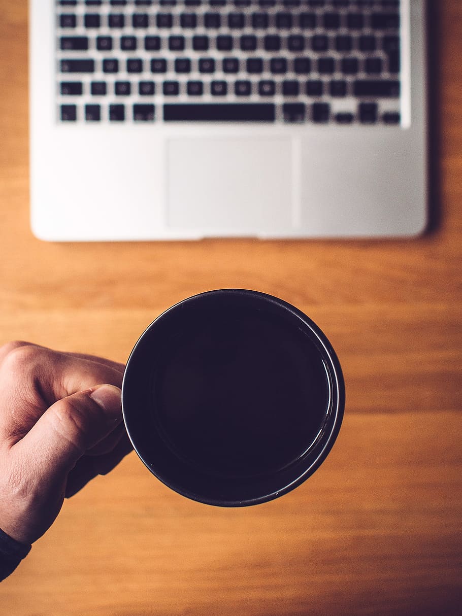 person holding black ceramic mug, coffee, cup, office, desk HD wallpaper