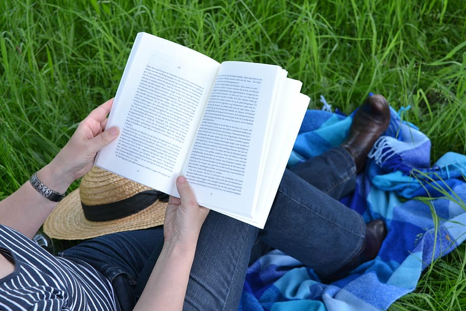 reading, book, reading book, leisure, publication, grass, low section HD wallpaper