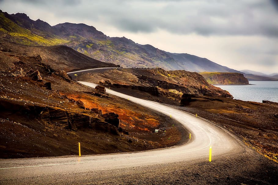 landscape photography of mountains, gray, road, cloudy, sky HD wallpaper