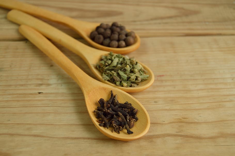Vegetables and Beans on Brown Wooden Measuring Spoon, close-up