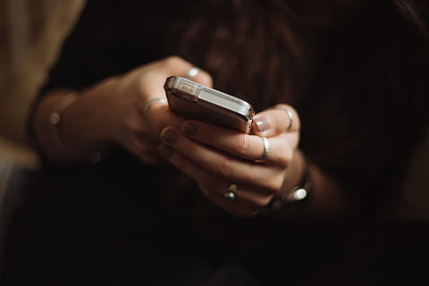 person using smartphone, person holding gray smartphone, iphone HD wallpaper