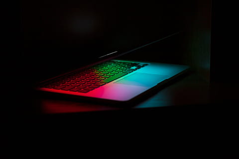 silver laptop computer showing pink and green lights, apple HD wallpaper