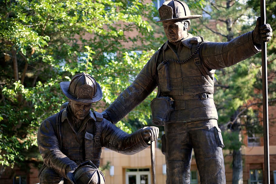 two fireman statues near tree, rescue, figures, concept, help HD wallpaper