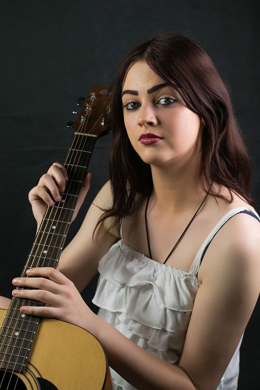 woman holding guitar, music, young, portrait, guitarist, emotion, HD wallpaper