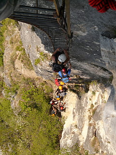 people climbing on black metal ladder during daytime, jam, full HD wallpaper