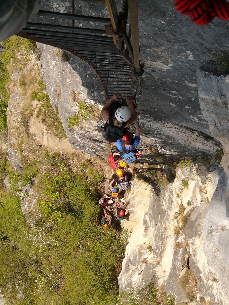 people climbing on black metal ladder during daytime, jam, full HD wallpaper
