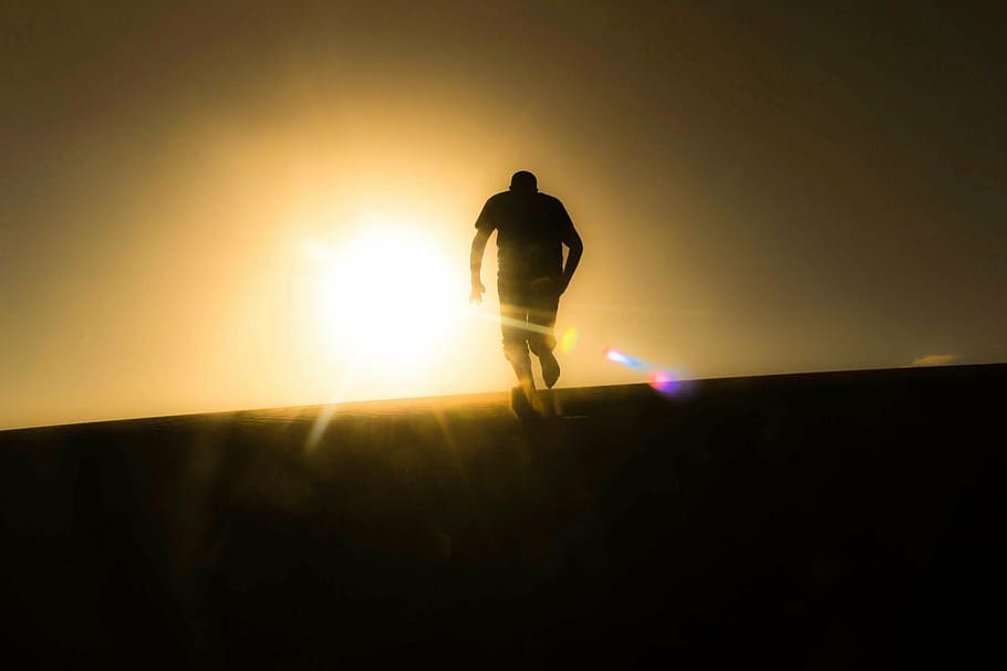 silhouette of man running, dark, guy, sunset, rays, landscape, HD wallpaper